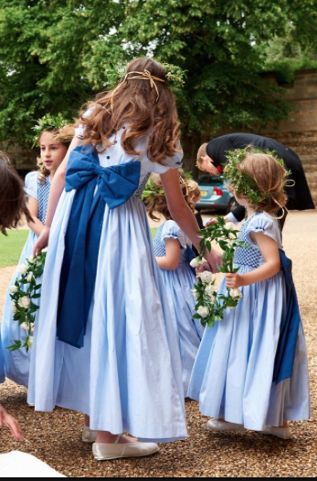 Special order of handmade smocked dresses for the wedding of Laline Hay