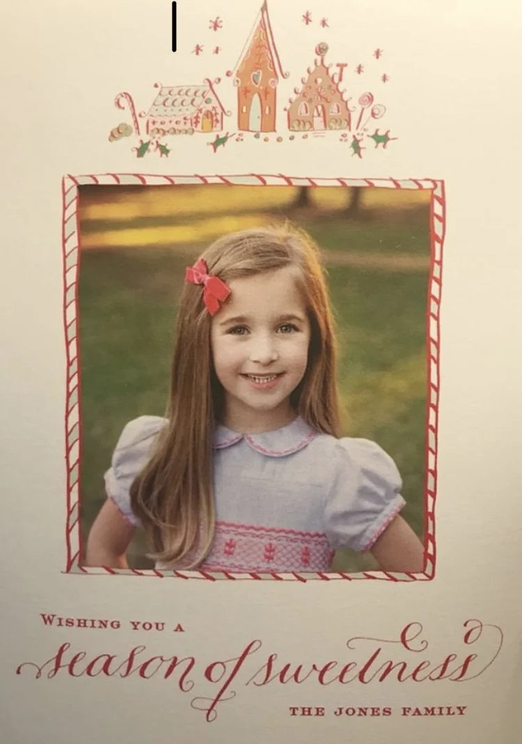 Christmas card Frazier in her handmade Princess Charlotte smocked dress
