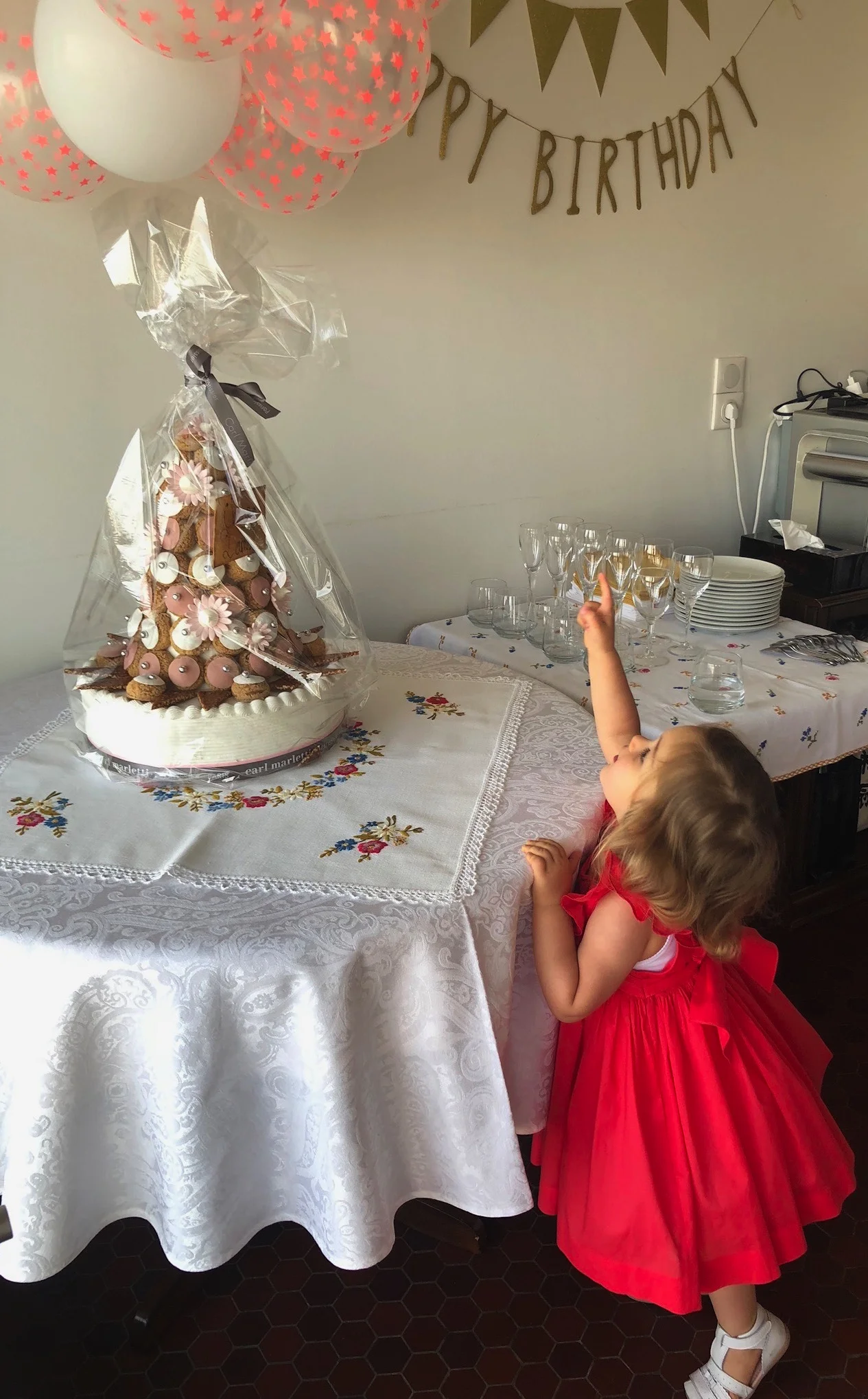 Darling Chiara celebrating her birthday in our red Poppy Netti dress