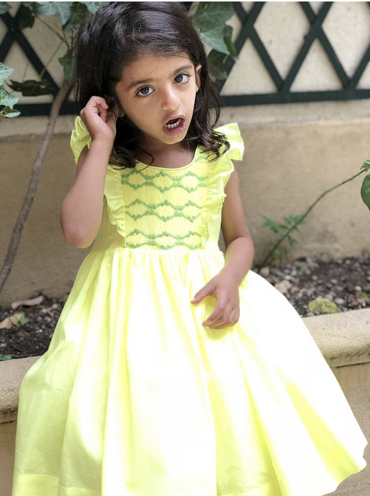 Beautiful little princess in her handmade yellow Netti dress