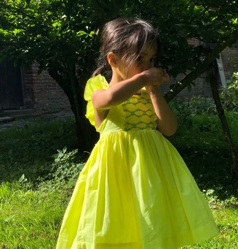 Olivia on holidays in the countryside wearing a handmade Daffodil Netti dress