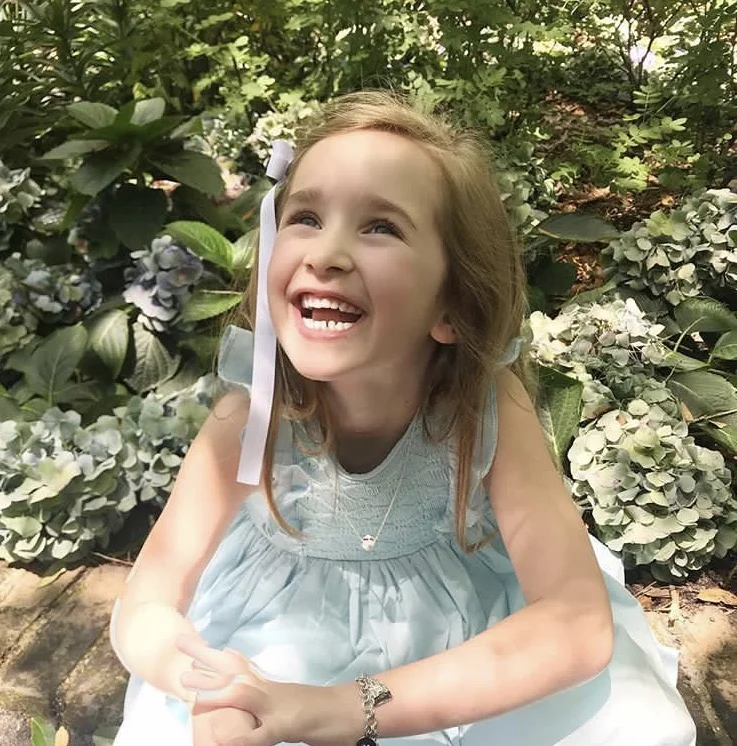 L'Île aux Fées - Frazier in her handmade Turquoise Netti summer smocked dress