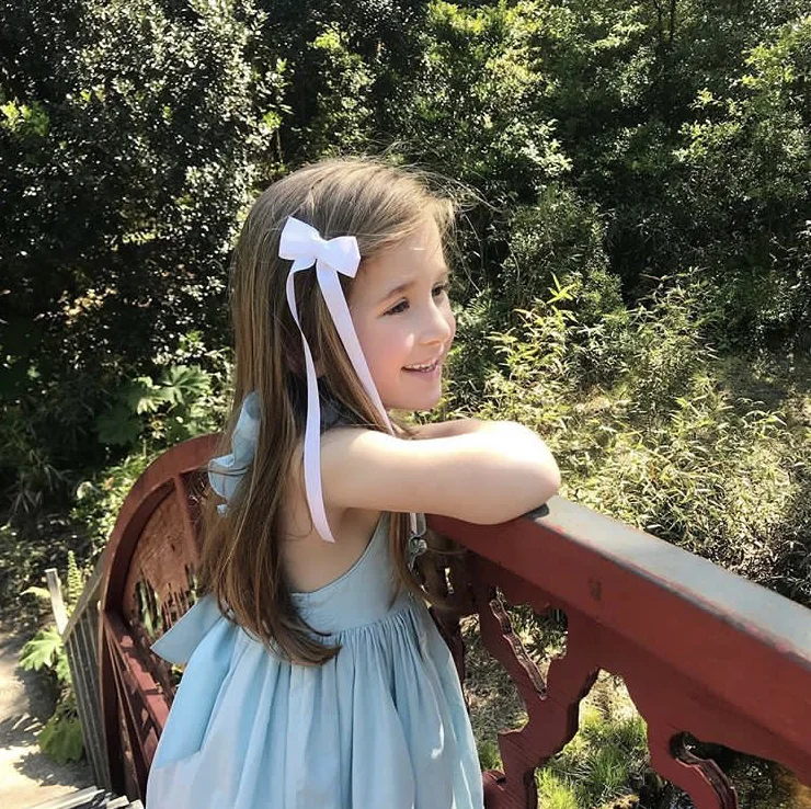L'Île aux Fées - Frazier in her handmade Turquoise Netti summer smocked dress