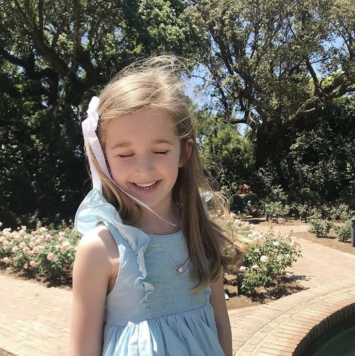 L'Île aux Fées - Frazier in her handmade Turquoise Netti summer smocked dress 