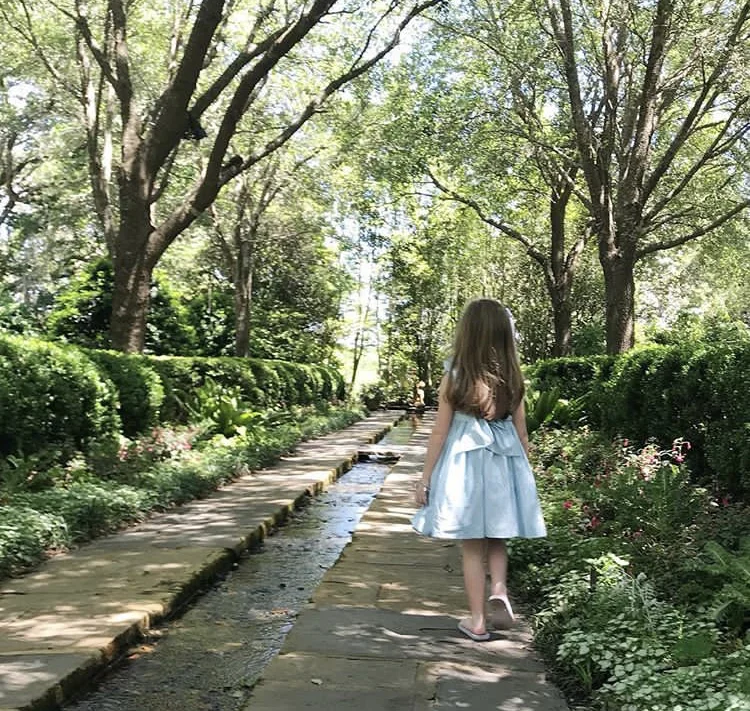 L'Île aux Fées - Frazier in her handmade Turquoise Netti summer smocked dress