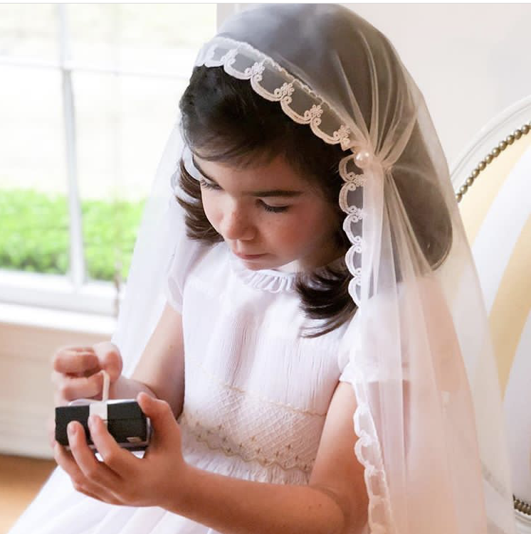 Thank you to Marie Thérèse for chosing our white Amandine smocked dress for her Holy Communion