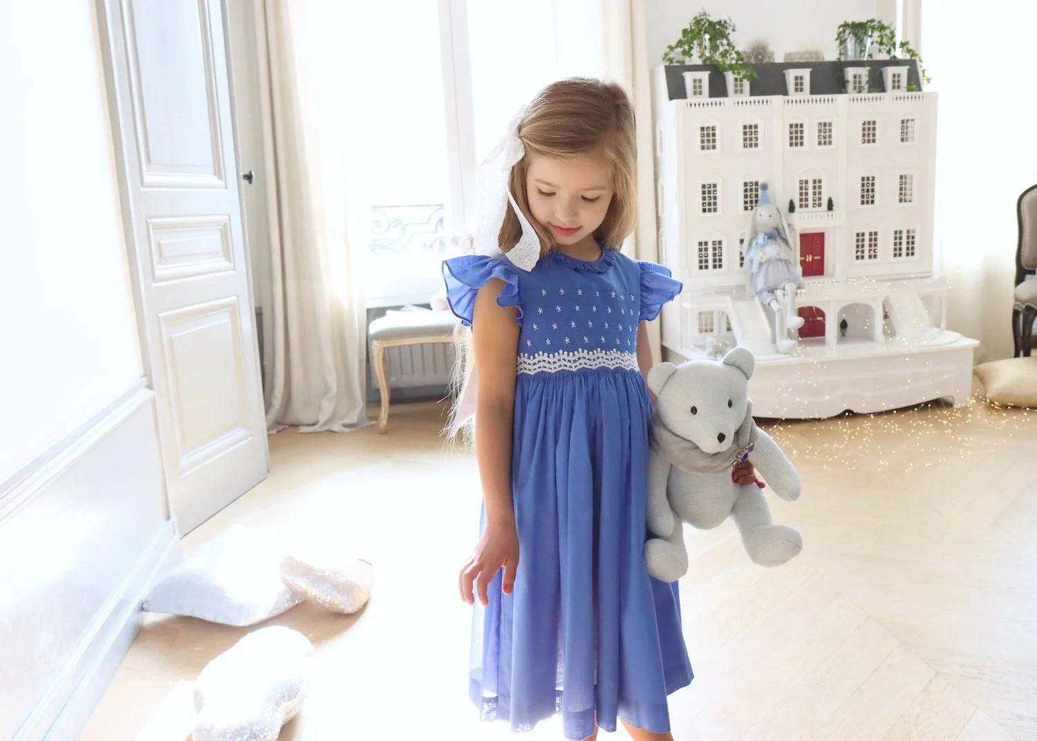 L'Île aux Fées handmade smocked dresses for babies and girls classic timeless French style boutique in Paris for children