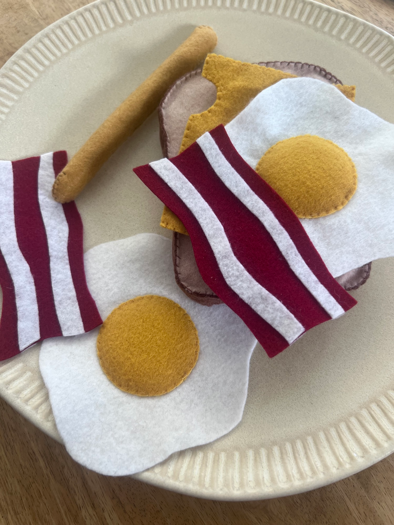  Sunny-side-up eggs and crispy bacon, the full breakfast plate. 